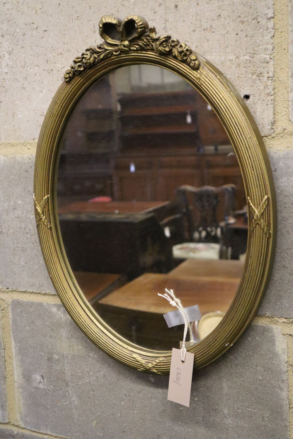 A George III style fret cut wall mirror and two others, tallest 102cm